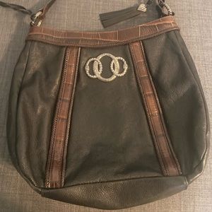 Super cute brown in black bag